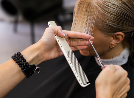 A blow dry hair package with cutting the ends of the hair and a hair oil bath for 79 SAR
